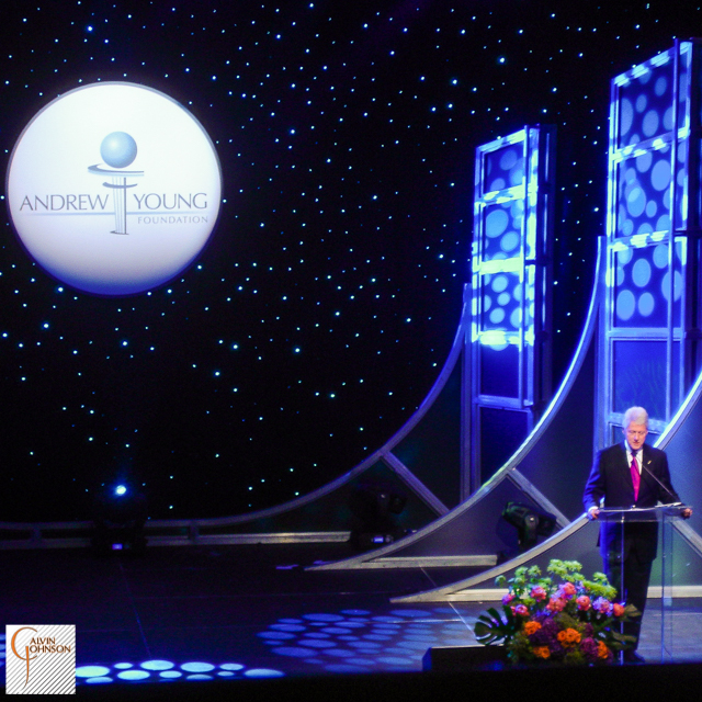President Bill Clinton Standing at Podium Giving a Speech