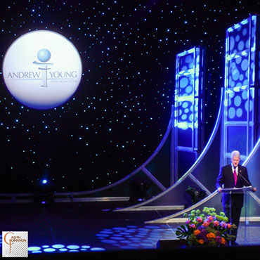 President Bill Clinton Standing at Podium Giving a Speech