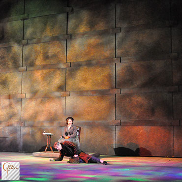 A performance of "Angels In America" at Carnegie Mellon. Ethel Rosenberg confronts Roy Cohn with a mysterious digital glow.