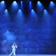 A performance of "Angels In America" at Carnegie Mellon. Blue beams of light and Digital images surround Harper Pitt as she enters Antarctica