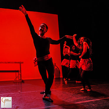 Dance performance at Carnegie Mellon University school of Drama were a male dancer intrudes upon a ballet class of female dancers.
