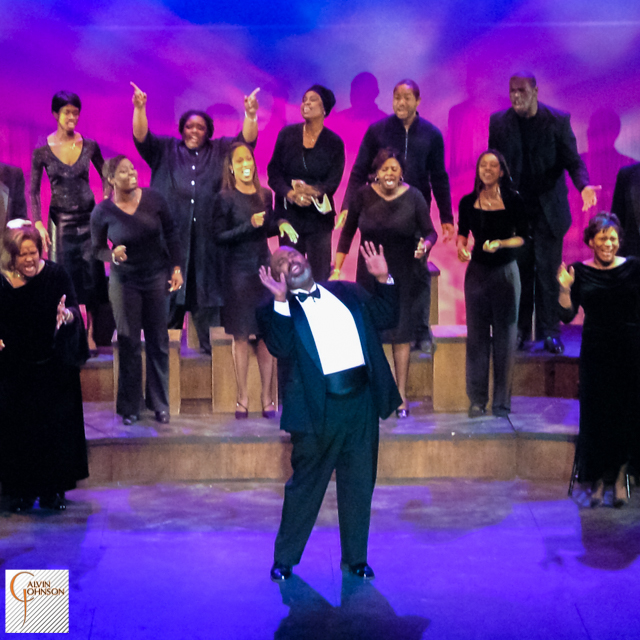 Choral members singing a musical number on stage from The Black Nativity Play.