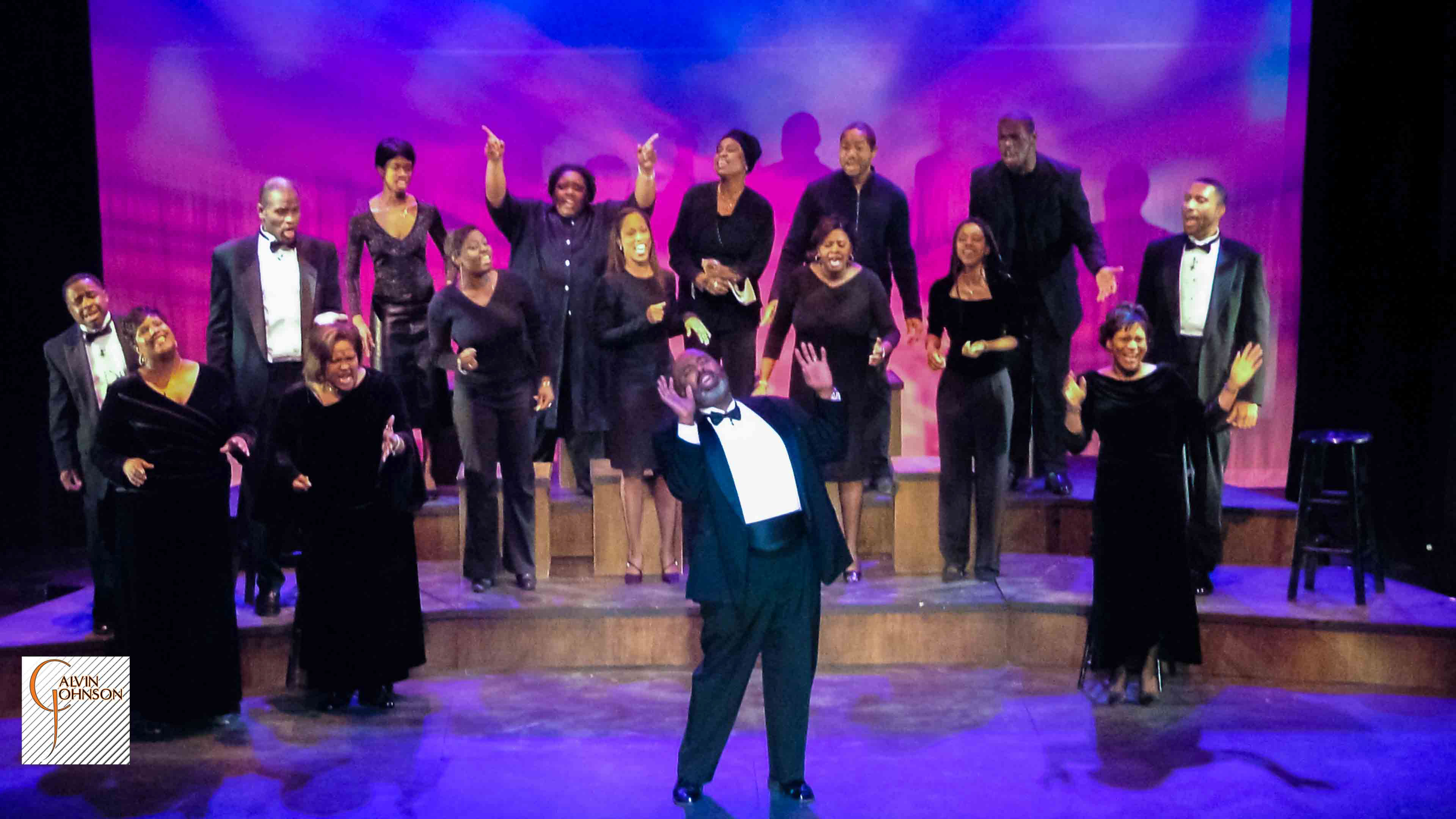 Choral members singing a musical number on stage from The Black Nativity Play.