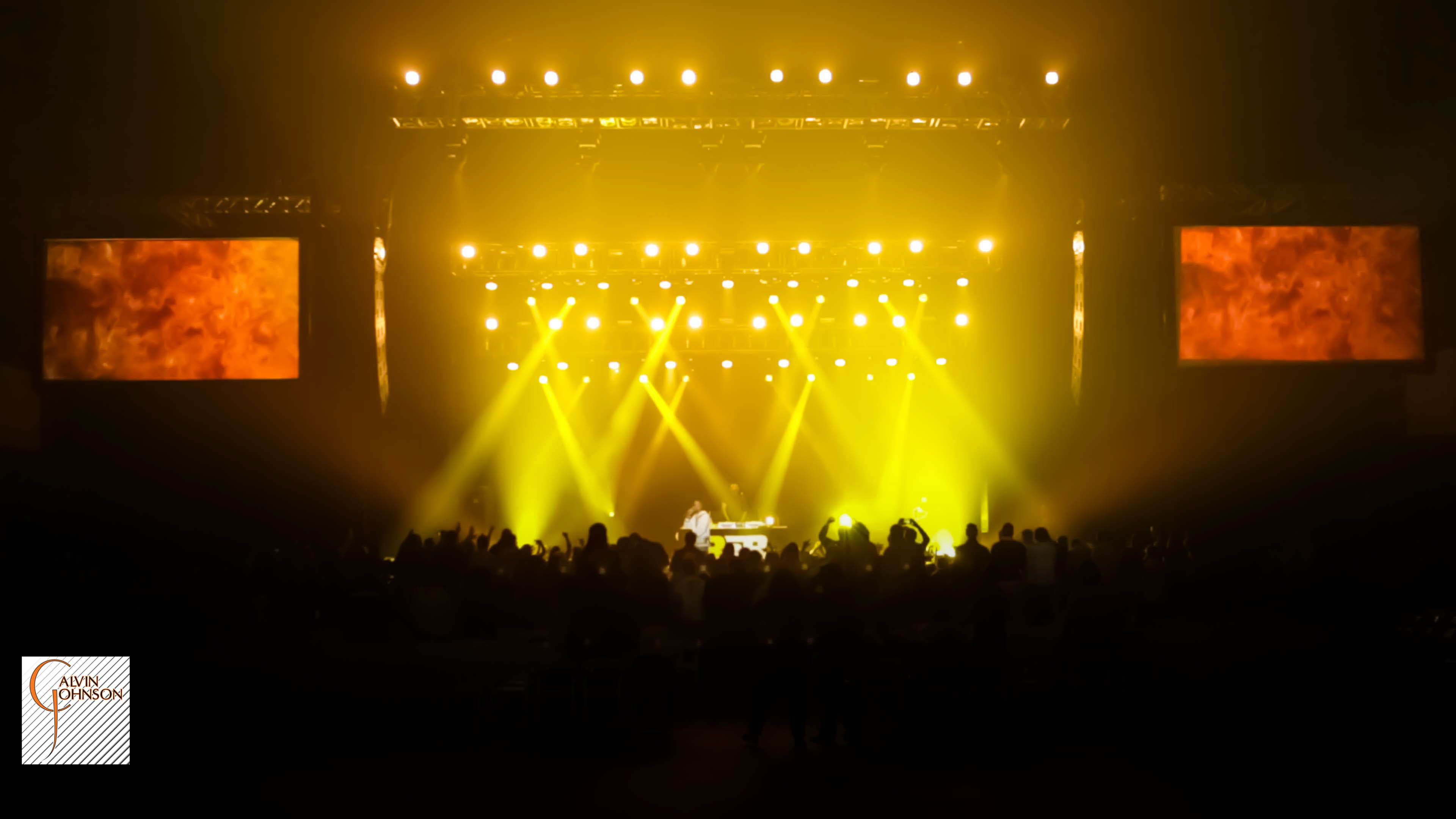 Hip Hop artist B.o.B performing at a concert with DJ Shawty Slim.