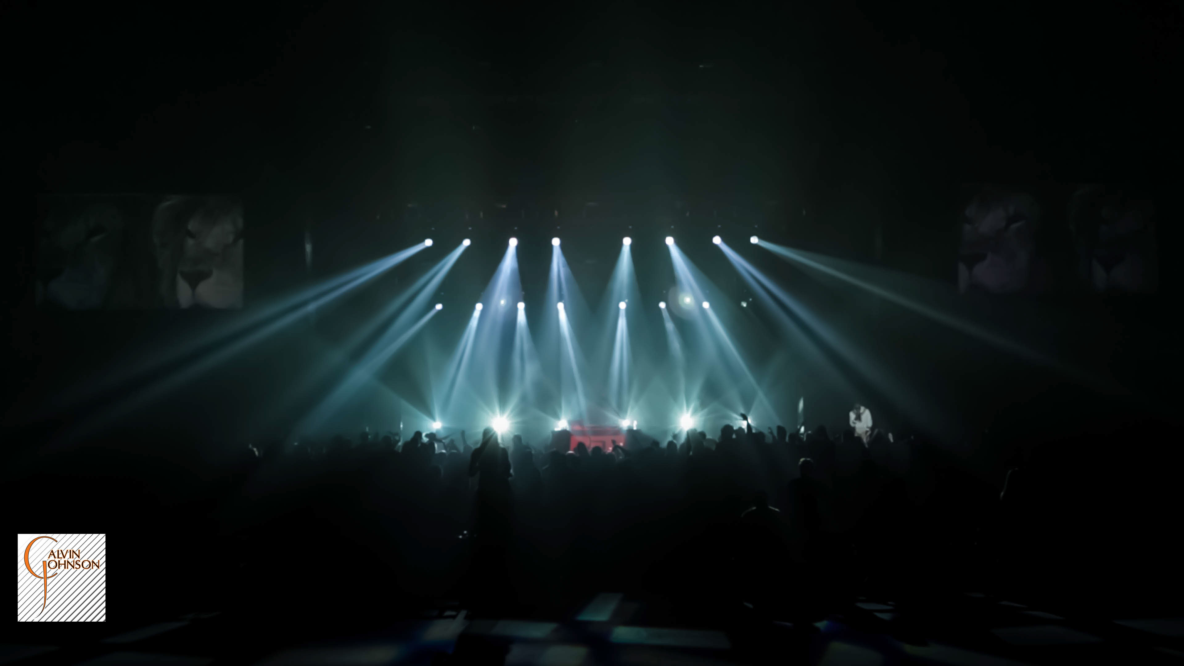 Hip Hop artist B.o.B performing at a concert with DJ Shawty Slim.