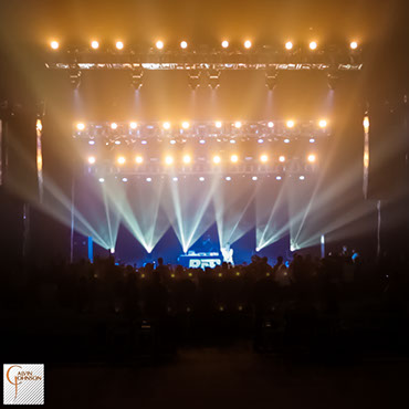 Hip Hop artist B.o.B performing at a concert with DJ Shawty Slim.