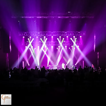 Hip Hop artist B.o.B performing at a concert with DJ Shawty Slim.