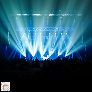 Hip Hop artist B.o.B performing at a concert with DJ Shawty Slim.