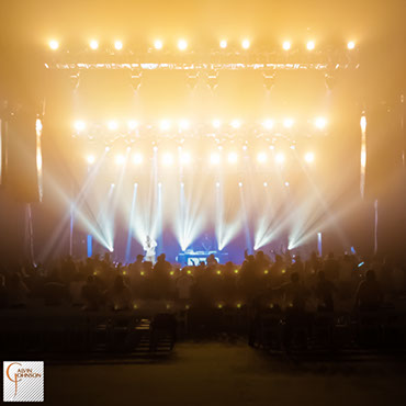 Hip Hop artist B.o.B performing at a concert with DJ Shawty Slim.