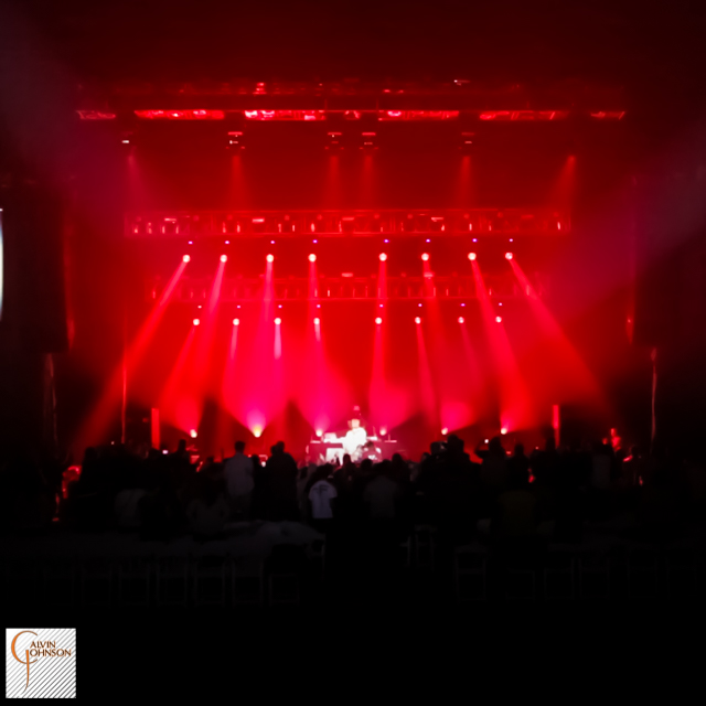 Hip Hop artist B.o.B performing at a concert with DJ Shawty Slim.