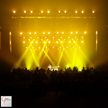 Hip Hop artist B.o.B performing at a concert with DJ Shawty Slim.