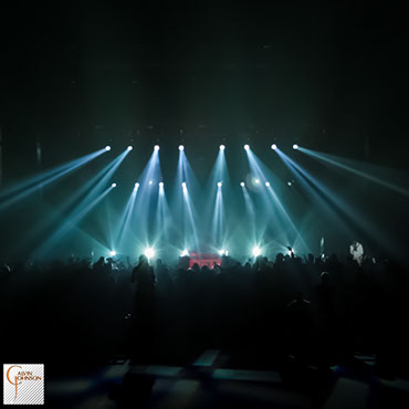 Hip Hop artist B.o.B performing at a concert with DJ Shawty Slim.