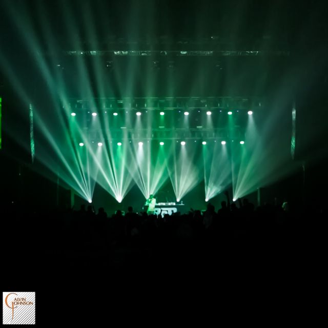 Hip Hop artist B.o.B performing at a concert with DJ Shawty Slim.