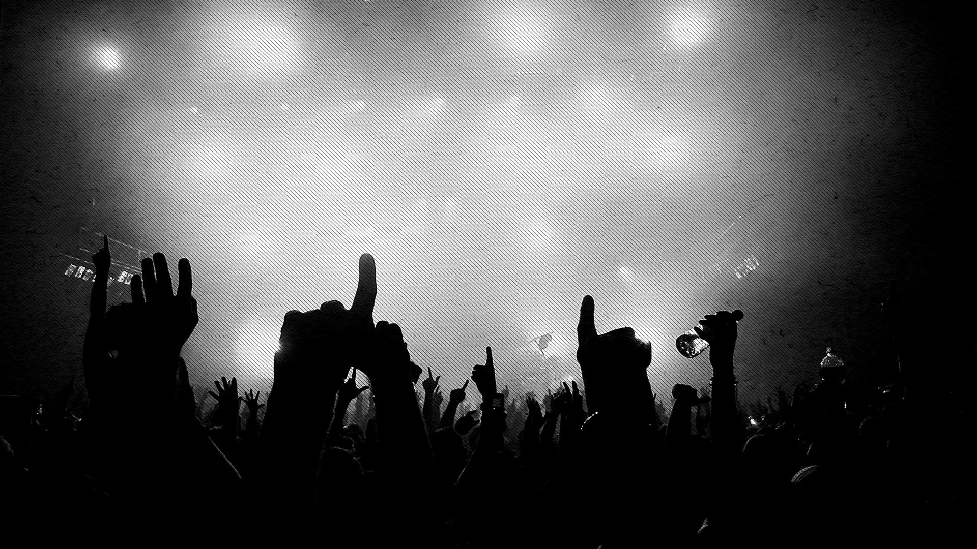 Background Image of a cheering crowd.