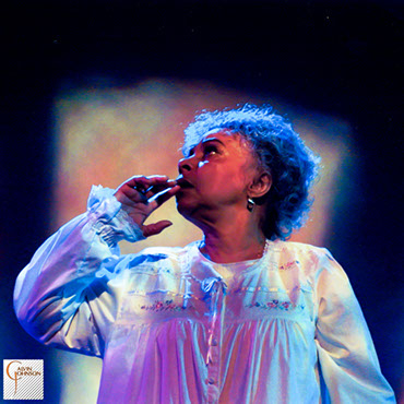 Three ghostly dancers spinning around in the play "Flying Over Purgatory"