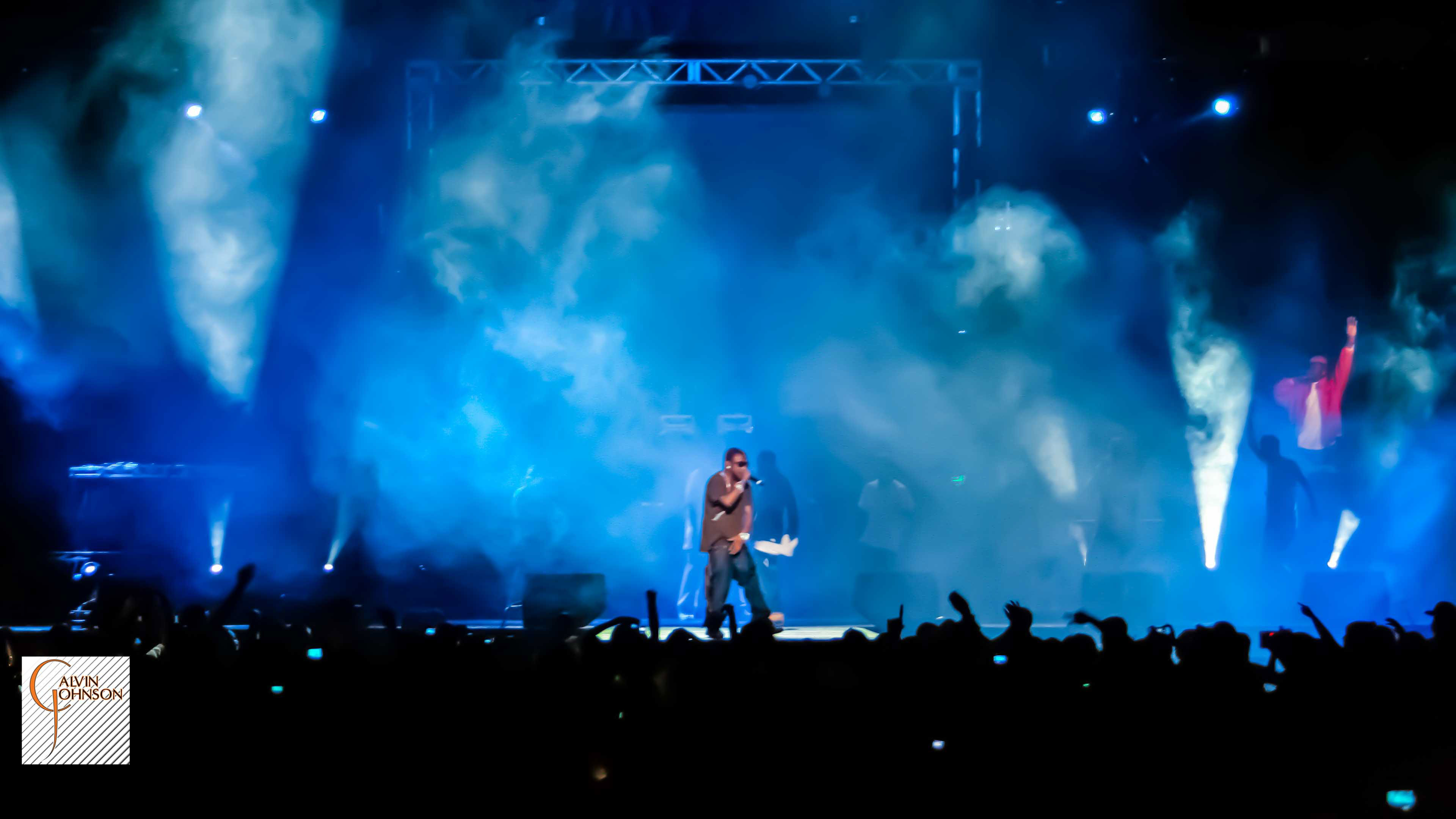 Blue lighting and smoke surrounding the opening act at Young Jeezy Concert at North Carolina A&T